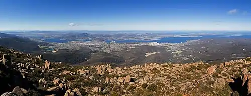 Image 20HobartPhoto credit: Noodle snacksA view of the greater Hobart area, as seen from Mount Wellington. The state capital and most populous city of the Australian island state of Tasmania, Hobart is located in the state's south-east, on the estuary of the River Derwent.More selected pictures