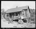 Children on porch of home of Black miners in company housing project, 1946