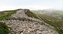 Remains of dry-stone fortifications at Tre'r Ceiri hillfort, Gwynedd