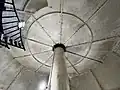Interior view of Gibbs Hill Lighthouse looking up at a ceiling