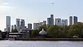 Island Gardens and Canary Wharf viewed from Greeenwich waterfront. April 2022.