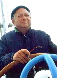 Jack Vance at the helm of his boat on San Francisco Bay in the early 1980s