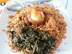 Image 10Jollof rice with vegetables and a boiled egg (from Malian cuisine)