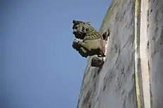 Jumping lion on the temple wall