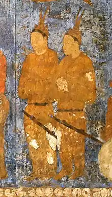 Korean ambassadors during an audience with king Varkhuman of Samarkand. They are identified by the two feathers on top of their head. 648-651 CE, Afrasiyab, Samarkand.