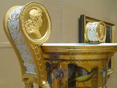 Neoclassical medallions on the handle of the Londonderry Vase, made by the Sèvres Porcelain Manufactory, designed by Charles Percier, decoration designed by Alexandre-Theodore Brogniart, flowers and ornament painted by Gilbert Drouet, and birds painted by Christophe-Ferdinand Caron, 1813, hard-paste porcelain, polychrome enamels, gilding, and gilt bronze mounts, Art Institute of Chicago, US