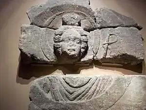 Luna holding a whip, from the Roman Baths.