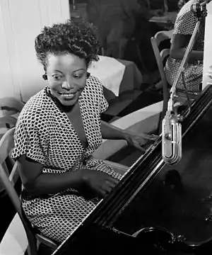 Image 9Mary Lou WilliamsPhotograph credit: William P. Gottlieb; restored by Adam CuerdenMary Lou Williams (May&nbsp;8, 1910&nbsp;– May&nbsp;28, 1981) was an American jazz pianist, arranger, and composer. She wrote hundreds of compositions and arrangements and recorded more than one hundred records. Williams wrote and arranged for Duke Ellington and Benny Goodman, and she was friend, mentor and teacher to numerous other jazz musicians. The second of eleven children, she was born in Atlanta, Georgia, and grew up in the East Liberty neighborhood of Pittsburgh, Pennsylvania. A young musical prodigy, she taught herself to play the piano at the age of three. This photograph of Williams at the piano was taken by William P. Gottlieb around 1946.More selected pictures