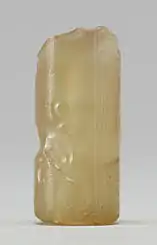 Mesopotamian cylinder seal-(view Side G) with griffin (Lion (with lion tail) and wings (on Side E)).The columns of inscription contain, at right: an (cuneiform)-(for DINGIR, god?), and pa (cuneiform).