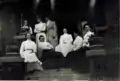 Porch of 4107 N Albina House with Mrs. Jeppesen and Friends Circa 1910