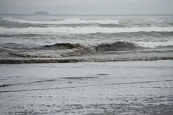 Waves with oiled water