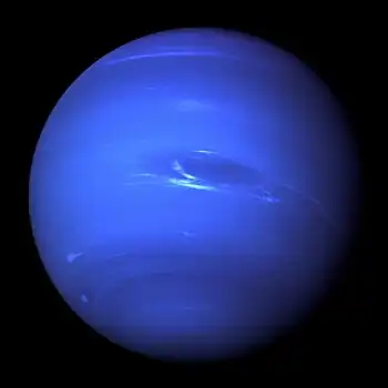 Image 12NeptunePhotograph credit: NASA / JPLNeptune is the eighth and farthest known planet from the Sun in the Solar System. In the Solar System, it is the fourth-largest planet by diameter, the third-most-massive planet and the densest giant planet. Neptune is 17 times the mass of Earth, slightly more massive than its near-twin Uranus. Neptune is denser and physically smaller than Uranus because its greater mass causes more gravitational compression of its atmosphere. Neptune orbits the Sun once every 164.8 years at an average distance of 30.1 au (4.5 billion km; 2.8 billion mi). It is named after the Roman god of the sea and has the astronomical symbol ♆, a stylised version of the god Neptune's trident.This picture of Neptune was taken by NASA's Voyager 2 spacecraft in 1989, at a range of 4.4 million miles (7.1 million kilometres) from the planet, approximately four days before closest approach. The photograph shows the Great Dark Spot, a storm about the size of Earth, in the centre, while the fast-moving bright feature nicknamed the "Scooter" and the Small Dark Spot can be seen on the western limb. These clouds were seen to persist for as long as the spacecraft's cameras could resolve them.More selected pictures
