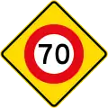 (W10-3) 70&nbsp;km/h speed limit ahead
