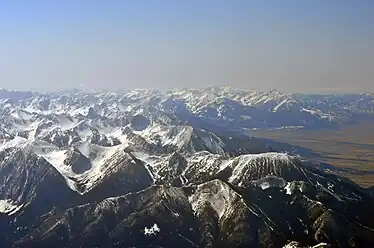 Northwest expanse of Absarokas as viewed from 15,000 feet (4,600&nbsp;m) over Livingston, Montana