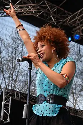 Image 13Oceana (singer)Photo: ChrisHamburgOceana (born 1982) is a German singer of German/Martiniquen descent. She is shown here performing at the Radio Hamburg Top 820.More selected pictures