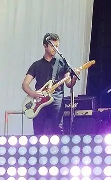Jon Howard performing with Paramore in 2014.