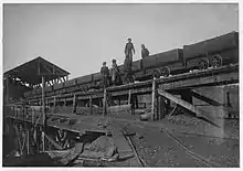 Child laborers on a minecart at Bessie Mine, Alabama, c. 1910-1911. Photo by Lewis Hine.