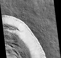 Pangboche Crater, as seen by HiRISE. Pangboche Crater is a very young 11&nbsp;km diameter crater near the summit of Olympus Mons. Notice the steep walls.