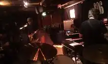 Stacey (left) with his band in 2011