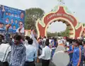 People dancing during the Namvistar Din celebrations at Dr. Babasaheb Ambedkar Marathwada University gate.