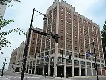 A large multi-story brick and stone building