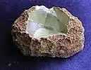 Prehnite nodule fragment, 11.0&nbsp;cm x 7.0&nbsp;cm, 338 grams.