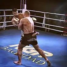 Image 7Riyadh Alazzawi fighting for his seventh world heavyweight kickboxing title in his hometown of Baghdad, Iraq. (from Sport in Iraq)