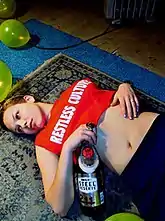 Image 24Model wearing a midriff shirt, a silver necklace, low ponytail and straight-leg leggings, 1999. (from 1990s in fashion)