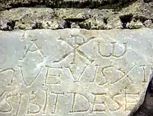 The Chi-Rho symbol ☧ with Alpha and Omega, Catacombs of Domitilla, Rome.