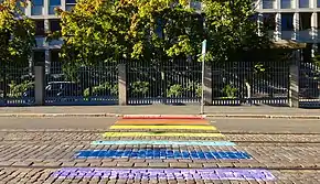 A zebra crossing outside the Russian Embassy, Helsinki painted with a rainbow.