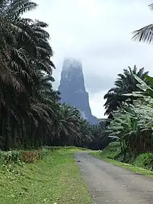 Pico Cão Grande, landmark volcanic plug peak on São Tomé Island (São Tomé and Príncipe), rising over 300 metres (980&nbsp;ft) above the surroundings.