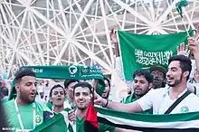 Image 13Saudi football fans cheering for their national football team at the FIFA World Cup (from Culture of Saudi Arabia)