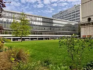 Sherfield Building, the central administrative building, from across the lawn. On the first floor are the junior and senior common rooms