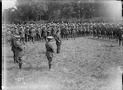H667. Deputy Prime Minister Sir Joseph Ward addresses the Pioneer Battalion at Bois-de-Warnimont, France, 30 June 1918. Photo: Henry Armytage Sanders