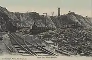 View of the Mt Morgan open cut mine, 1905