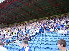 Stockport county fans in the Cheadle End stand during a match.
