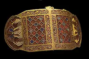 Shoulder-clasps from Sutton Hoo; early 7th century; gold, glass & garnet; length: 12.7&nbsp;cm; British Museum (London)