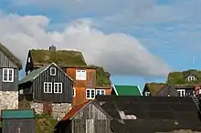 Image 1Traditional Faroese houses with turf roof in Reyni, Tórshavn. Most people build larger houses now and with other types of roofs, but the turf roof is still popular in some places. (from Culture of the Faroe Islands)