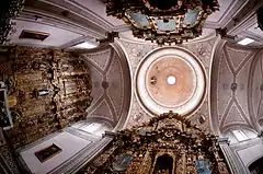 Altarpiece and lateral reredos in the Church of Santa Rosa de Lima in Morelia, Mexico, built in the late 18th century.