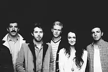 The Paper Kites in 2012. L–R: Dave Powys, Sam Bentley, Sam Rasmussen, Christina Lacy, Josh Bentley