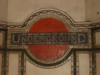 Image 2Early style tube roundel in mosaic at Maida Vale Underground station.
