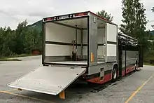 Image 432003 Volvo 9700S on B12M from Telemark Bilruter, with all doors open. Manual pallet jack is standard equipment for one-man operation. (from Bruck (vehicle))