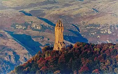 Image 16The Wallace Monument is a sandstone tower, built in the Victorian Gothic style. It stands on the summit of Abbey Craig, a volcanic crag above Cambuskenneth Abbey, from which Wallace was said to have watched the gathering of the army of English king Edward I, just before the Battle of Stirling Bridge.Photo credit: Ray Mann