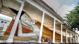 The ancient reclining Buddha statue of Wat Ku